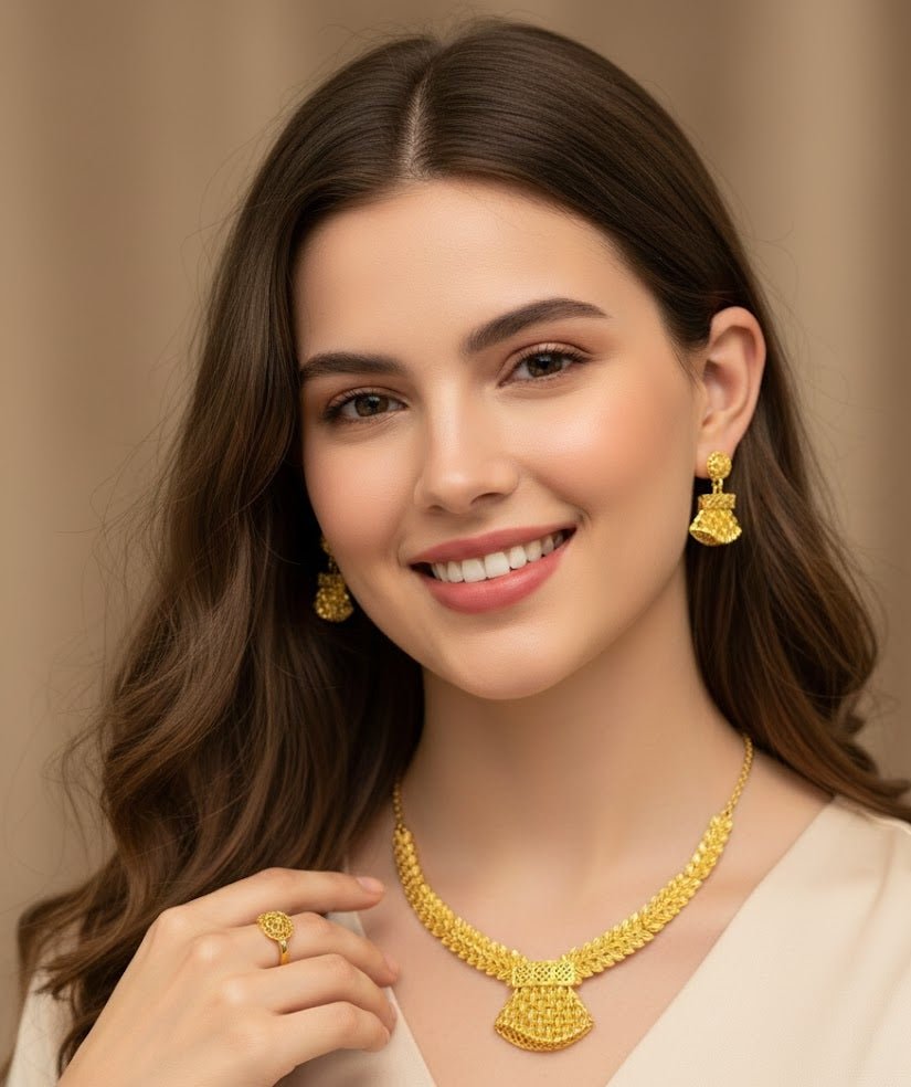 https://cdn.shopify.com/s/files/1/0777/4122/8329/files/luxe-royal-leaf-gold-jewelry-set-6234124.jpg?v=1767746772